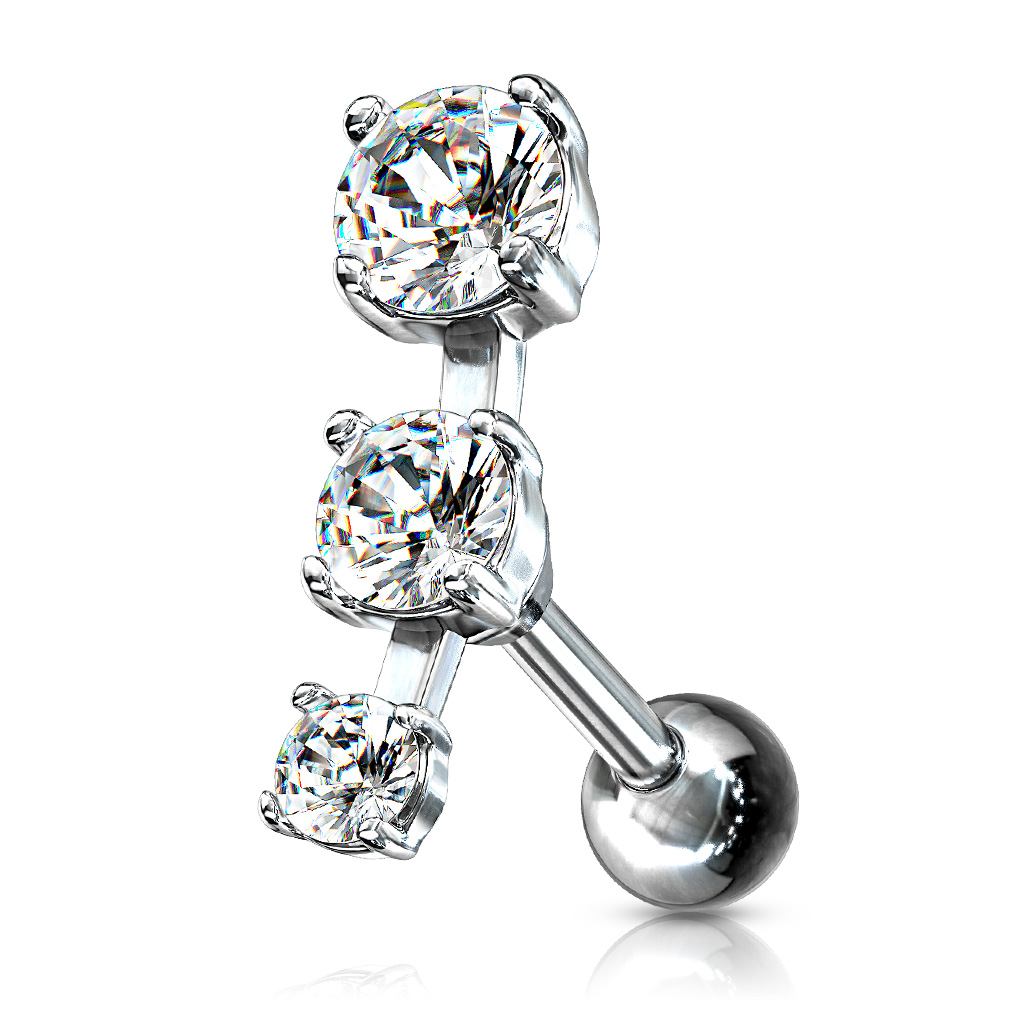 Ohrpiercing mit drei Steinen in einer Reihe